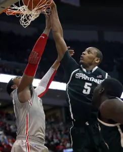 Adreian Payne dunks over Ohio State's Jared Sullinger.