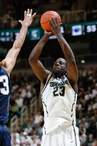Draymond Green knocks down a shot.
