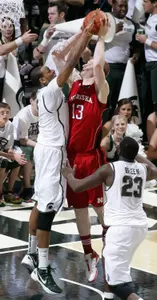 Adreian Payne blocks a shot by Nebraska's Brandon Ubel.