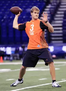 Kirk Cousins throws in front of NFL scouts at the NFL Combine Sunday at Lucas Oil Stadium.