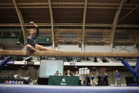 Sophomore Alex Page scored a career-high 9.900 to win the balance beam.