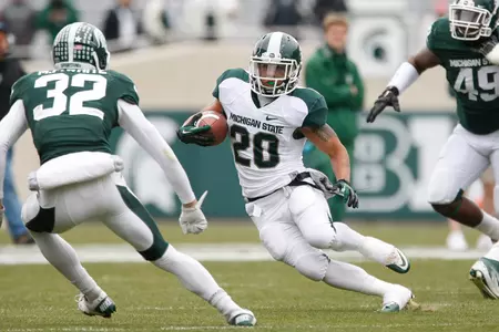 Nick Hill had a 32-yard touchdown run for the White in MSU's spring game Saturday at Spartan Stadium.