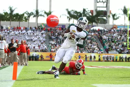 Le'Veon Bell led the Spartans in rushing yards (948) and rushing TDs (13) in 2011.