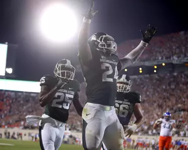 Le'Veon Bell ran for a career-high 210 yards in the win over No. 24 Boise State Friday night.