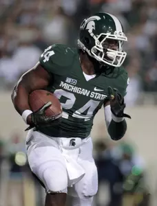 Le'Veon Bell rushes against Notre Dame.