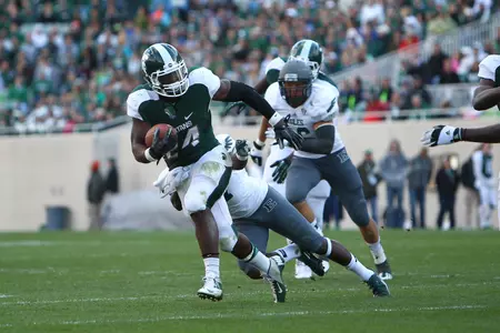 Le'Veon Bell ranks third in the NCAA FBS in rushing, averaging 152.5 yards per game.