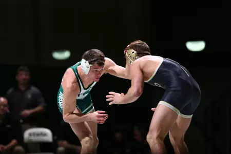 No. 19 David Cheza lost a narrow 6-4 decision.