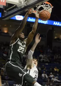 Branden Dawson dunks against Penn State.