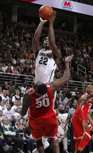 Branden Dawson puts up a shot against Ohio State.