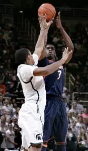Michigan State's Gary Harris defends.