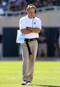 Spartans head coach Mark Dantonio walks the sideline