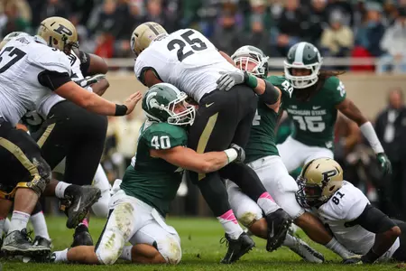 Max Bullough and the No. 1 Spartan defense will look to slow down Illinois quarterback Nathan Scheelhaase and the Fighting Illinois offense this weekend in Champaign, Ill.