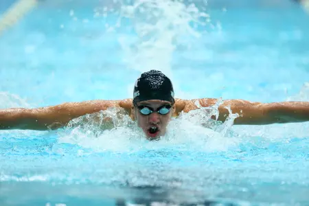 Bryan Williams won both the 100 and 200 butterfly for the Green team.