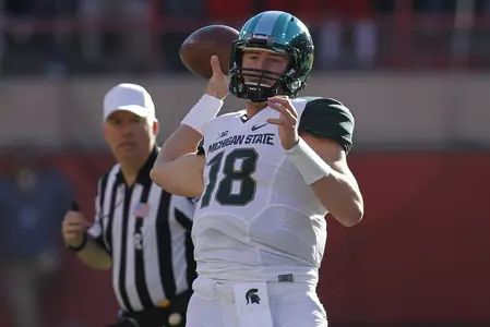 Connor Cook completed 15-of-31 throws for 193 yards and a TD in MSU's 41-28 win at Nebraska.