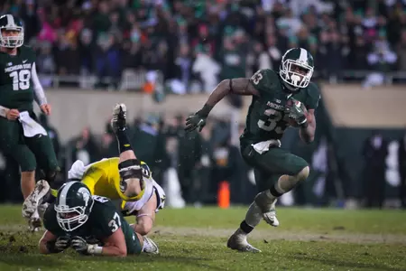 Jeremy Langford recorded his four-straight 100-yard rushing game, with a career-best 26 carries for 120 yards vs. U-M including a 40-yard TD run.