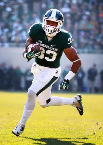 Jeremy Langford tied a school record by rushing for more than 100 yards in his seventh-straight game.