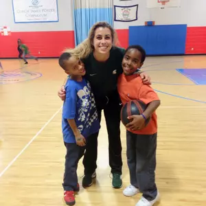 Freshman Kaylee Phillips with kids from the Boys and Girls Club of Lansing.
