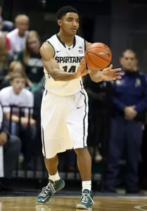 Gary Harris (14) looks to pass.