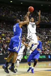 Keith Appling shoots a jumper during MSU's 22-point win over Memphis in the third round of the NCAA Tournament on Saturday.