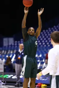 Keith Appling shoots a jumper at Thursday's practice in Indianapolis.