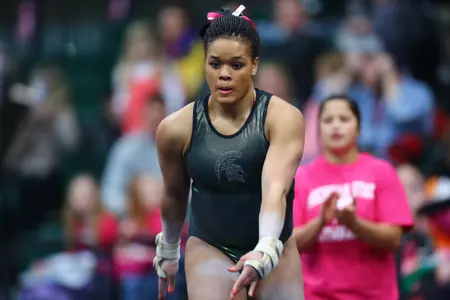 Sophomore Alina Cartwright leads the Spartans on beam, averaging a 9.760.