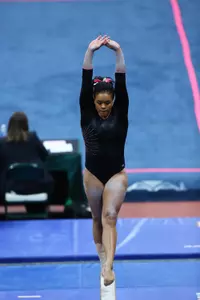 Sophomore Alina Cartwright tied for 20th on uneven bars with a mark of 9.675.