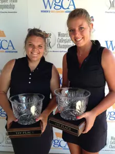 Liz Nagel and Trisha Witherby with their first-place trophies at the Pure Silk Women's Collegiate Team Championship.