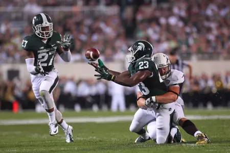 Following his first career interception, Jairus Jones lateraled the ball to Kurtis Drummond, who raced 21 yards into the end zone in the first quarter against Western Michigan.