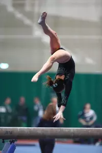 Holly Ryan hit a personal-best score of 9.775 on the balance beam at Michigan.
