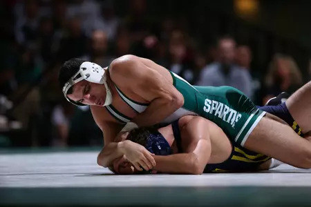 John Rizqallah nearly upset third-ranked Ethen Lofthouse of Iowa in the 184-pound match Saturday night at Iowa City, but fell, 3-2.