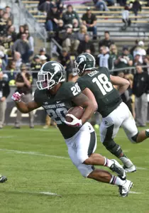 Nick Hill and the Spartans rushed for 294 yards in the win at Purdue.