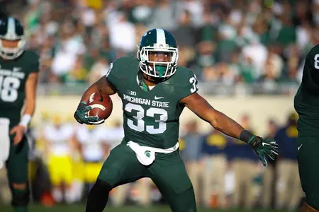 Jeremy Langford rushed for a career-high 177 yards and tied a career high with three rushing touchdowns against Michigan.