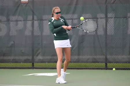 Lexi Baylis tallied a win in singles and doubles on Friday