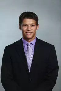 Mitch Rogaliner won his first career Big Ten dual match with a 7-5 victory over Jordan Bremer Friday night at No. 2 Minnesota.