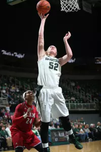 Senior forward Becca Mills tied a career-high with a game-best 22 points to lead No. 19/21 Michigan State to a 90-38 rout at Loyola Chicago Sunday afternoon.