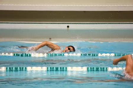 Alex Trompke swam in two events on Friday