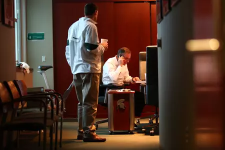 MSU head coach Mark Dantonio speaks to Montez Sweat on the phone after MSU received his National Letter of Intent on Wednesday morning.