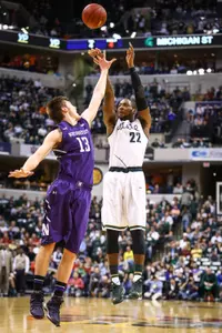 Branden Dawson scored 16 points and collected nine rebounds in MSU's 67-51 win over Northwestern in a Big Ten Tournament quarterfinal.