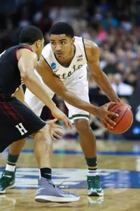 Gary Harris scored 14 of his 18 points in the second half as Michigan State defeated Harvard, 80-73, in the third round of the NCAA Tournament.
