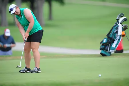 Michigan State senior Allyssa Ferrell putts during Wednesday's second round of the NCAA Women's Golf Championships at the Tulsa Country Club. Ferrell is tied for second place after 36 holes with a 2-under-par 138 (69-69). (Photo by Tim Cowie)