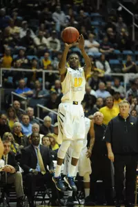 Eron Harris will transfer into Michigan State after two seasons at West Virginia.