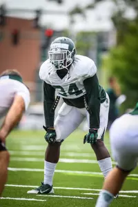 Taiwan Jones and the Spartan defense will look to slow the offense during Friday's scrimmage.