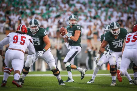 Connor Cook completed 12-of-13 first-half throws for 285 yards and three TDs vs. Jacksonville State.
