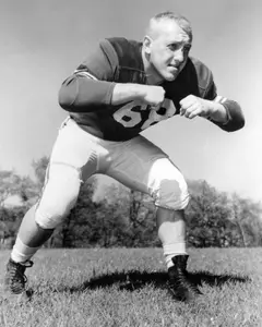 Carl "Buck" Nystrom was an All-America guard on MSU's 1955 National Championship team under Duffy Daugherty.