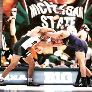 John Rizqallah tallied his team-leading eighth dual win of the season Friday night at Indiana as the Spartans defeated the Hoosiers, 26-16.