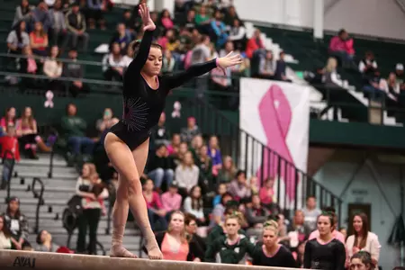 Sophomore Holly Ryan on beam