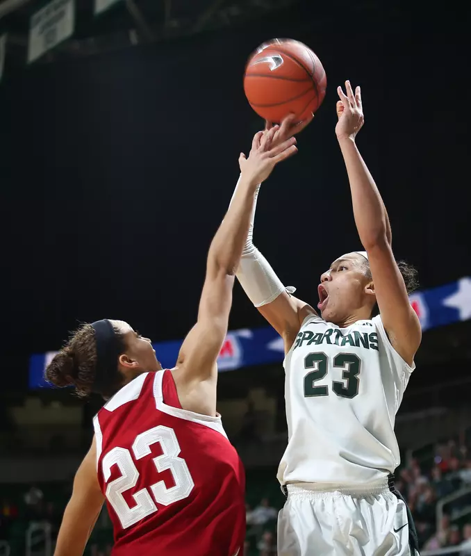Sophomore forward Aerial Powers tied the school record with her 19th double-double.