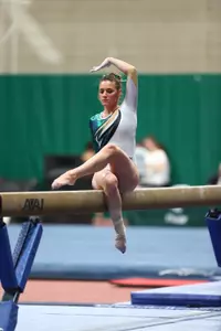 Michigan State senior Ashley Noll competes on beam