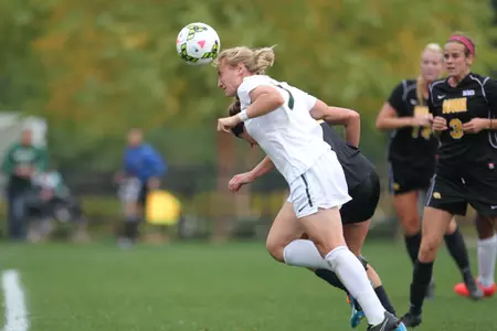 Senior Mary Kathryn Fiebernitz completes a header.