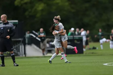 Senior Sarah Kovan runs to embrace fellow senior Allyson Krause after the game-winning goal.